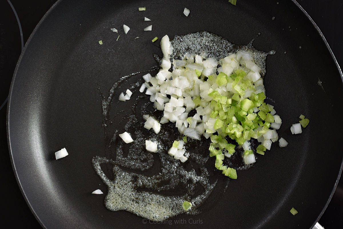 Diced onion and celery in skillet with melted butter.