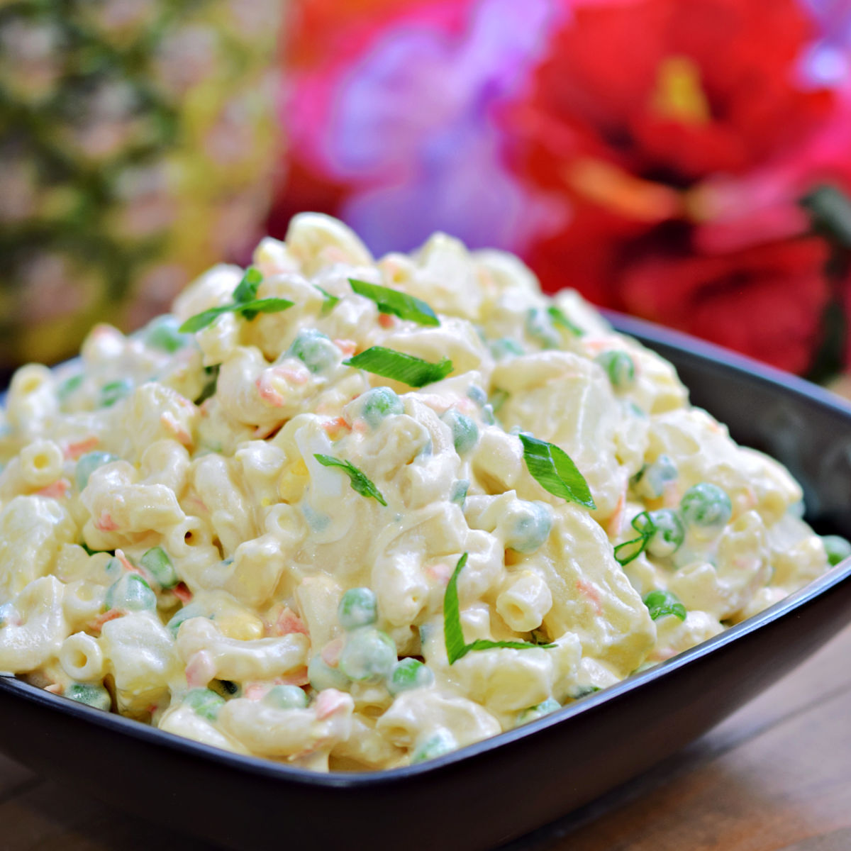 A bowl of Hawaiian potato salad with macaroni.