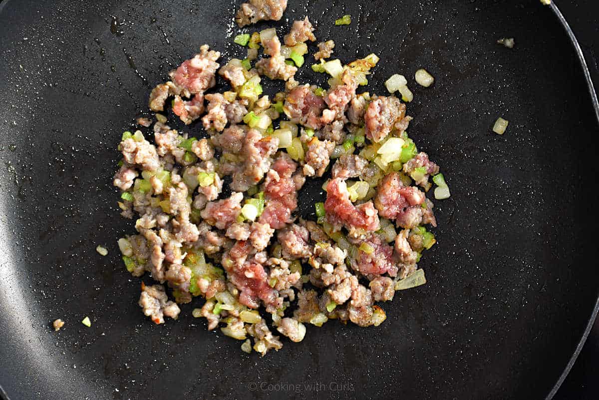 Sausage, celery, and onion in skillet.