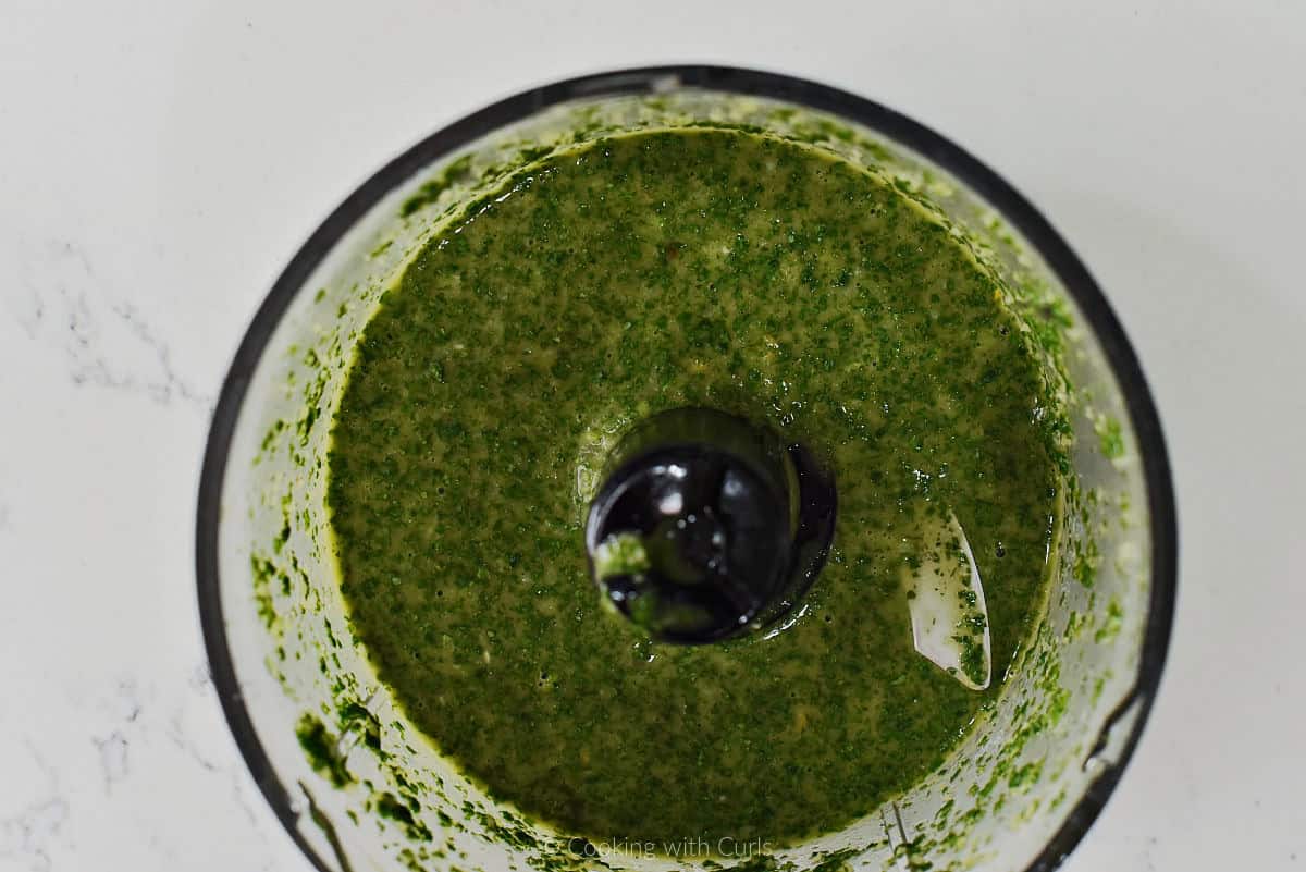 Chimichurri sauce in food processor bowl.