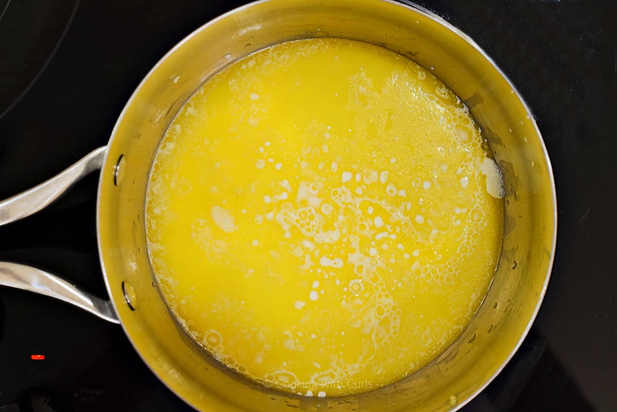 Melted butter and cream in sauce pan.