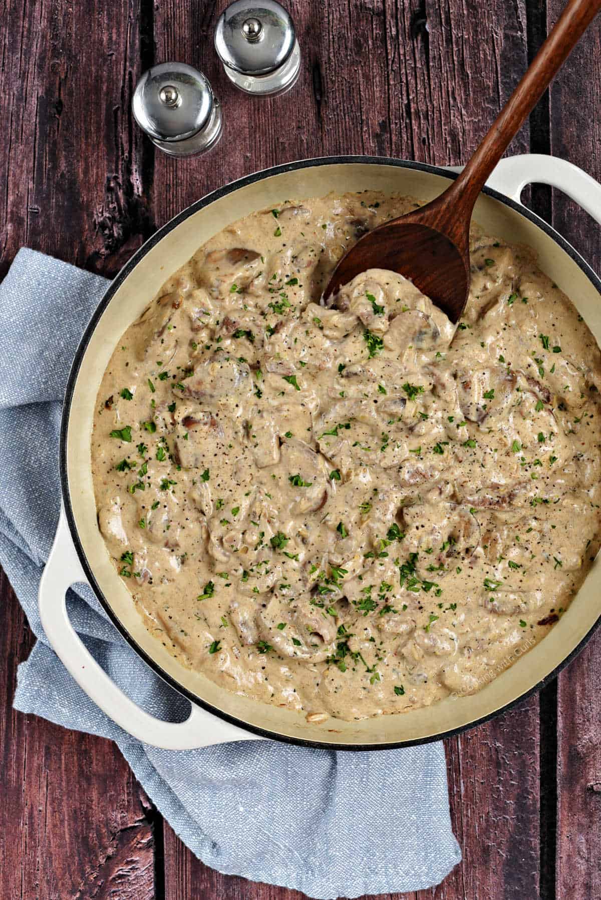 Creamy beef and mushroom slices in a large skillet.