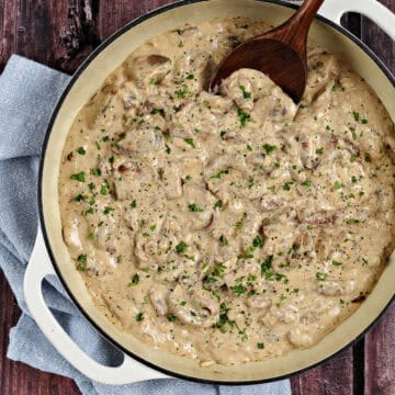 Creamy beef and mushroom slices in a large skillet.