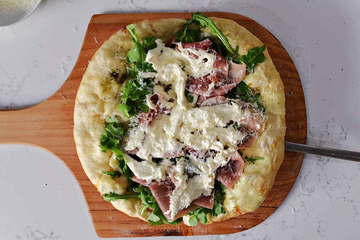 Panuozzo on wood pizza peel.